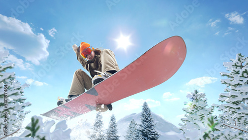 Snowboarder girl in action. Extreme winter sports.