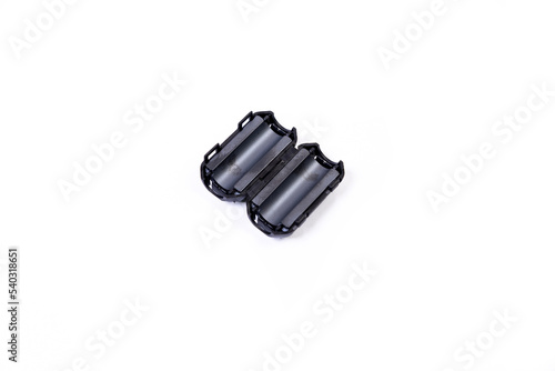 Close up of a ferrite bead inductor on isolated white