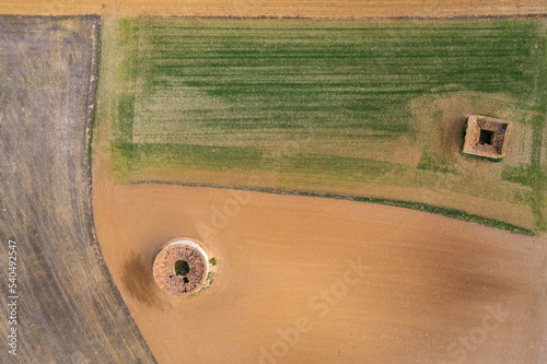 Aerial view of round and square dovecotes