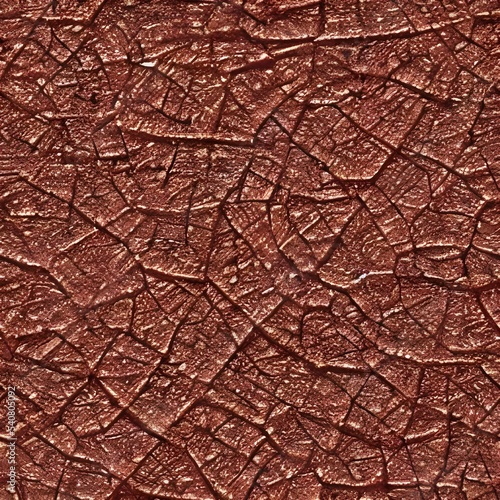 There is a texture of rust that looks like it was once seamless, but has since been broken apart. The edges of the rust are jagged and rough, while the center appears to be smooth.