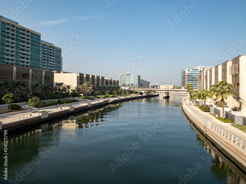 The canal and buildings in the Al Raha Beach neighbourhood in Abu Dhabi. Al Raha Beach is a mixed-use development with waterfront apartments.