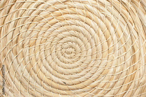 hand woven with natural fiber in spiral form