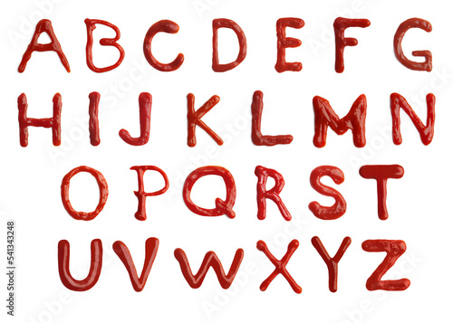 Alphabet made of ketchup on white background