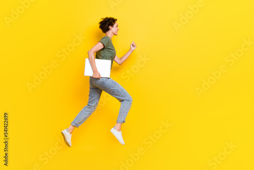 Full length photo of funny funky lady addicted user look empty space shopping sale modern device ad isolated on yellow color background