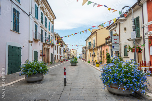 The beautiful main street of San VIto Chietino with colored flowers and facades