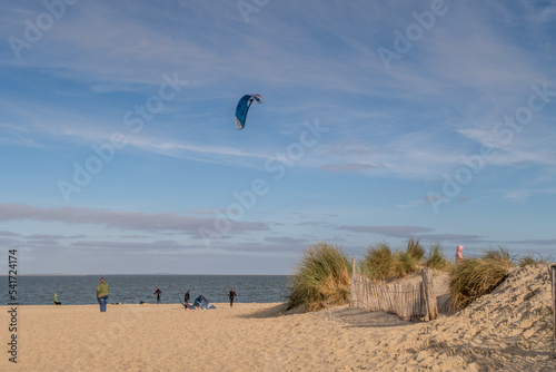 Texel, Netherlands. October 2022. Kitesurfers on the beach of Texel.