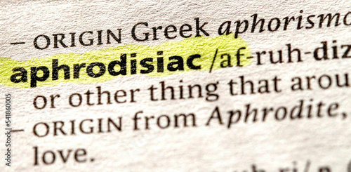 Close up photo o the word aphrodisiac in a dictionary book