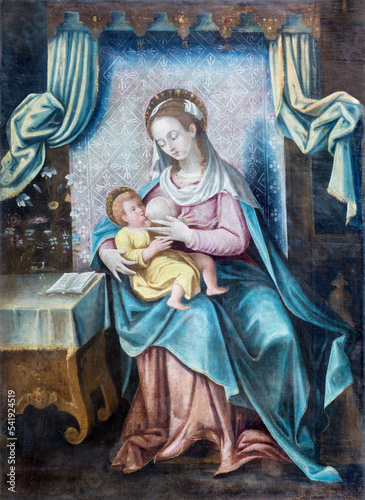 IVREA, ITALY - JULY 15, 2022: The painting of Beastfeeding Madonna in the church Chiesa di San Salvatore by unknown artist.