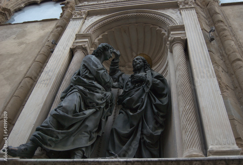 Christ and St. Thomas, a bronze sculpture made by Andrea del Verrocchio and placed outside Orsanmichele church in Florence, Italy 