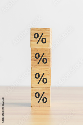wood block with percentage symbol icon. Interest rate, financial, inflation, recession, ranking and mortgage rates concept