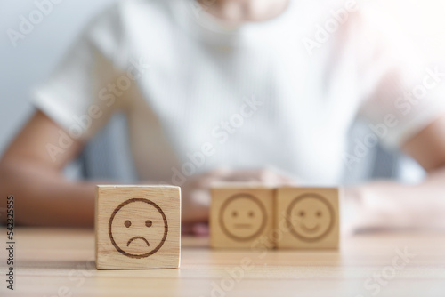 unhappy angry face from Emotion block. customer review, bad experience, negative feedback, satisfaction, survey, rating service, assessment, mood, world mental health day concept