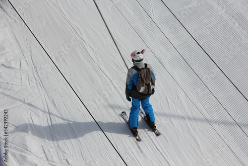 High angle shot of a person skiing in Beaufortin near Albertville in Savoie