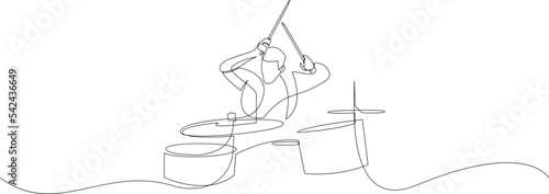 Continuous line drawing of a man playing drum isolated on white background. A drummer person one line art. Vector illustration.