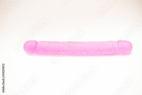 Double ended pink silicon dildo, sex toy isolated on white background
