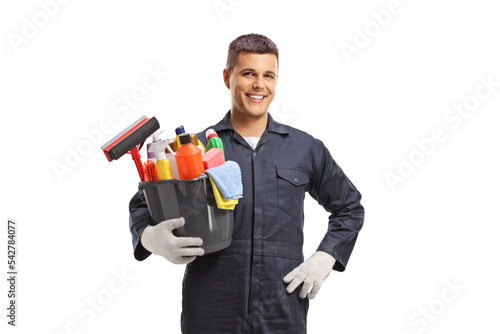 Male janitor holding a bucket with cleaning supplies