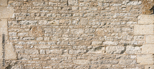Old stone wall pattern or texture, detail of ancient UK church