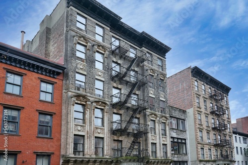 Facades of historic apartment buildings near Greenwich Village in New York