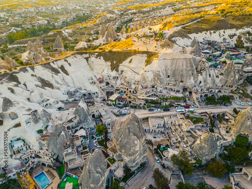 Panoramic drone view of the Capadoccia valleys, rock formations, and Nevsehir town in the Central Anatolia Region of Turkey. High quality photo