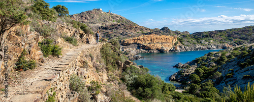 Woman tourist hiking on Cap de Creus, Costa brava in Spain