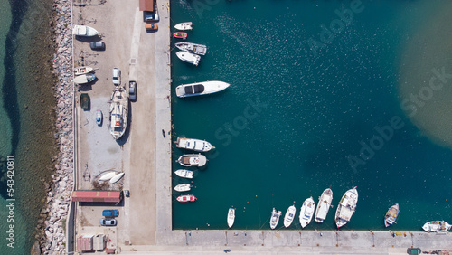 Small yacht port seen from aerial drone view in the Aegean island of Samos