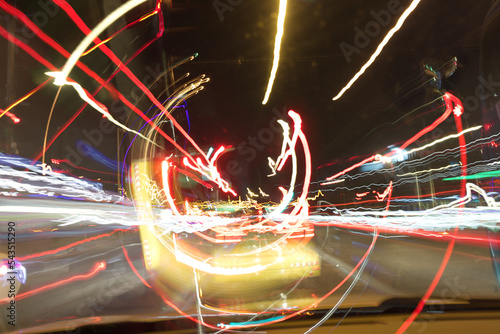 Driving in the city at night.