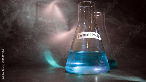 Focus of formaldehyde 37% CH2O chemical compound in glass flask inside a chemistry laboratory with copy space