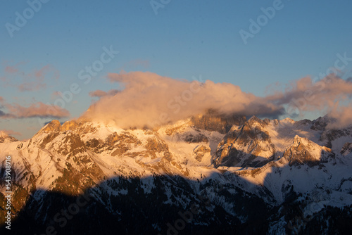 sunset in the dolomites covered by snow