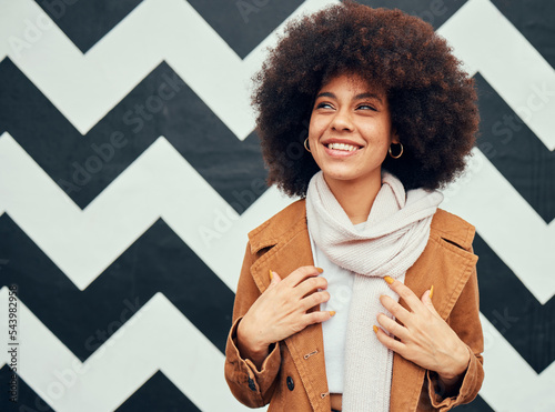 Travel, fashion and black woman in a city against a wall, pattern and background, happy and excited for change. Woman, smile and student with a vision in New York, cheerful, optimistic and inspired