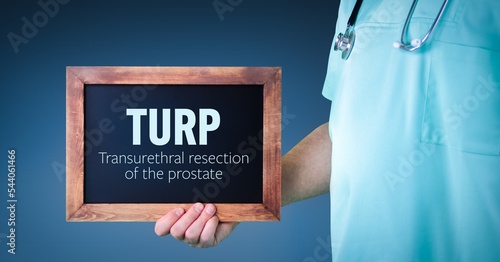Transurethral resection of the prostate (TURP). Doctor shows sign/board with wooden frame. Background blue