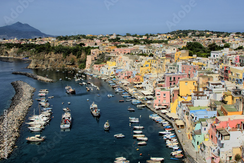 Procida island, Naples, Italy, colorful houses in Marina di Corricella harbour on sunrise light