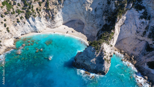 Aerial drone photo of steep white cliffs in secluded paradise beach in Northern part of Kefalonia island, Ionian ,Greece