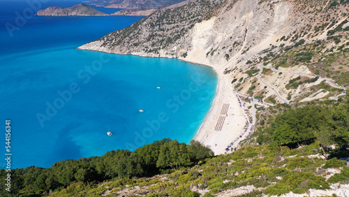Aerial drone photo of paradise beach of Myrtos with crystal clear turquoise sea surrounded by steep cliffs