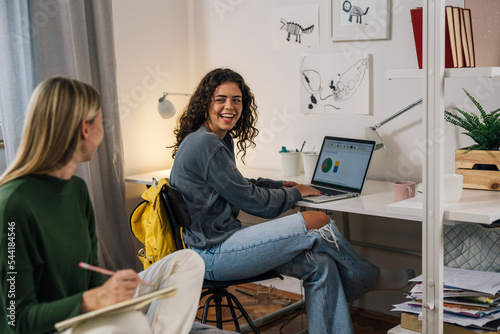 college female students studying in room