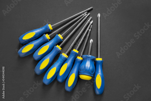 Screwdrivers on black background