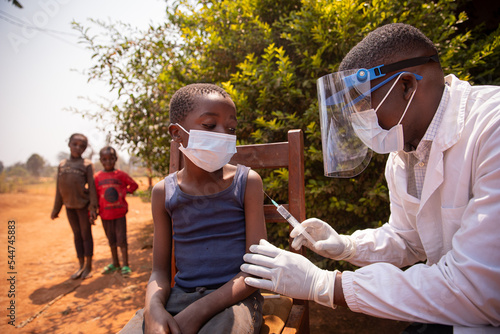 Open air vaccination session in an african village during corona virus pandemic