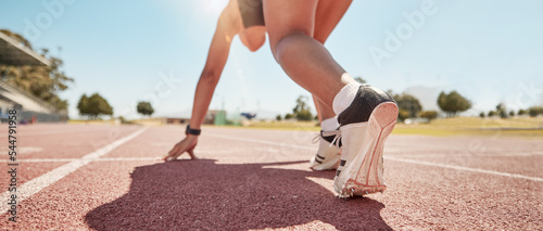 Runner start race, running track and competition, challenge or cardio fitness on stadium ground. Closeup marathon athlete, sprinter shoes and woman ready in sports training, race track event or speed