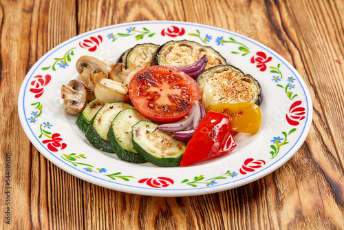 grilled vegetables on the wooden background