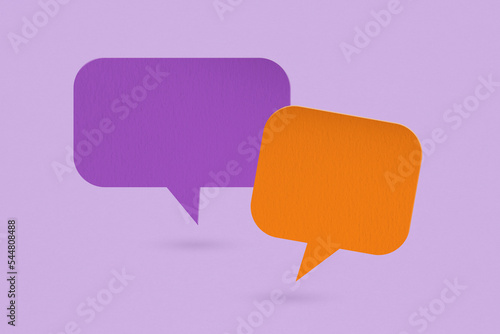 orange and violet speech bubble grunge paper cut on grunge background. Conceptual image about communication and social media, customer feedback