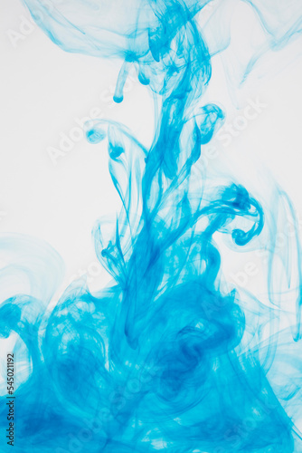 blue ink dissolving in water