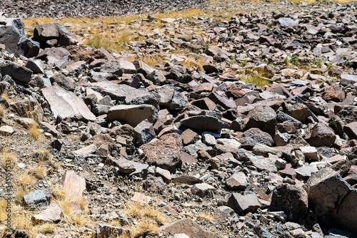 Stone scree from rock fragments in the mountains of Armenia.