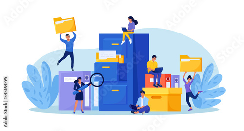 Document archiving and storage. Business people search files in archives. Support service, database. Men working with information, documents and statistics in analytical department. Folder in archive
