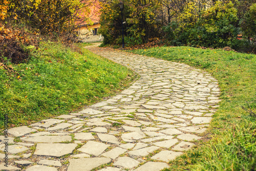 Stone pathway in autumn season.High quality photo.