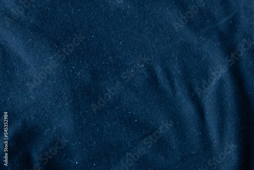 Black dark blue canvas fabric cotton background with folds copy space