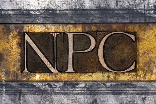 NPC text with on grunge textured copper and gold background 