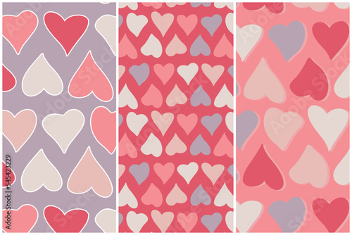 Fun colorful Valentine hearts vector pattern. Three seamless tiles in different styles. Creative wrapping paper, bedroom décor, website design, app design, and textiles pattern with love motif.