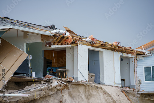 Luxury beach homes collapse under heavy waves caused by Hurricane Nicole Daytona Beach FL