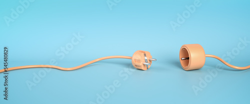 Blackout or disruption concept: Separated Plug and Socket lying on a blue background