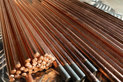 Copper coated graphite electrodes