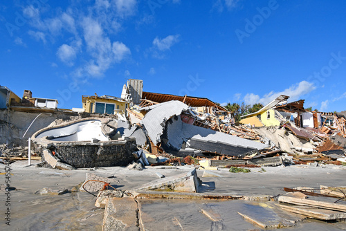 Oceanfront homes and seawalls heavily damaged during Hurricane Nicole and Ian in Daytona Beach area of Volusia County, Florida 