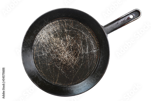 Flat lay of black cast-iron frying pan isolated on transparent background